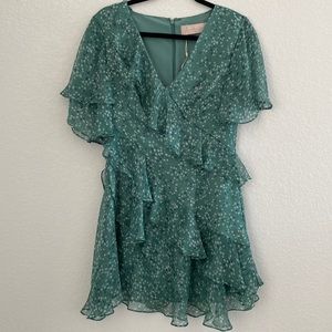 GREEN MINI FLORAL FLUTTER DRESS